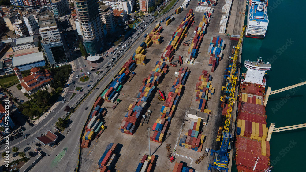Fototapeta premium Top-Down Aerial View of Cargo Containers, Cranes, and Ship in Durrës Port