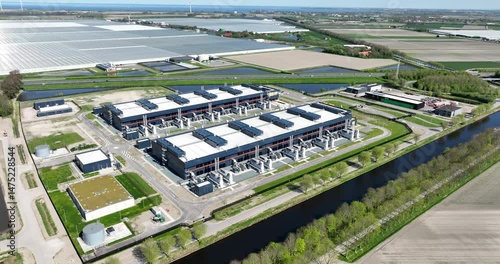 data center, computing center, hyperscaler, computer servers, cloud services, it services, aerial view. Building exterior.