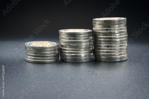 Stack of coins, money and finances.
