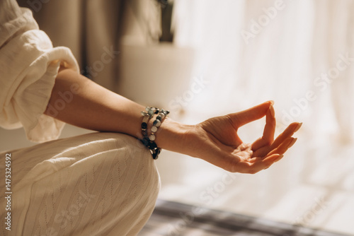 Woman hand in yoga symbolic gesture mudra