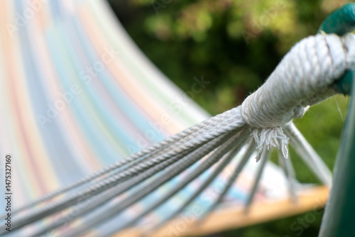 Obraz na płótnie Hammock, rest and recreation in the garden.
w salonie