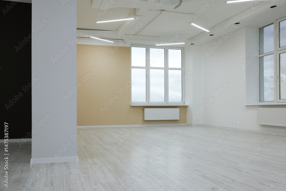 Fototapeta premium New empty room with clean windows and light walls