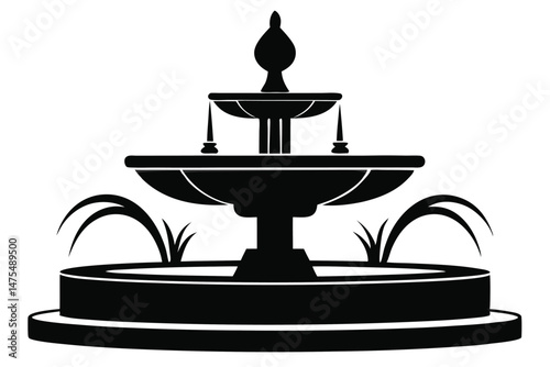 The tiered fountain shows a classic silhouette with water features and a bold black color