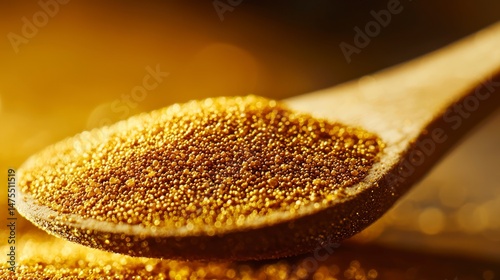 Close Up of Bee Pollen Granules in Wooden Spoon for Healthy Recipes