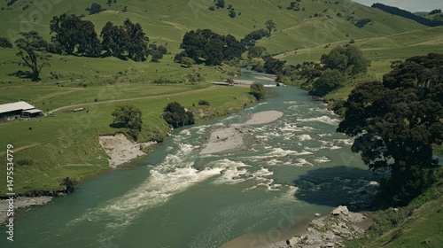 Crystal Clear River Flowing Through Lush Green Valley Landscape