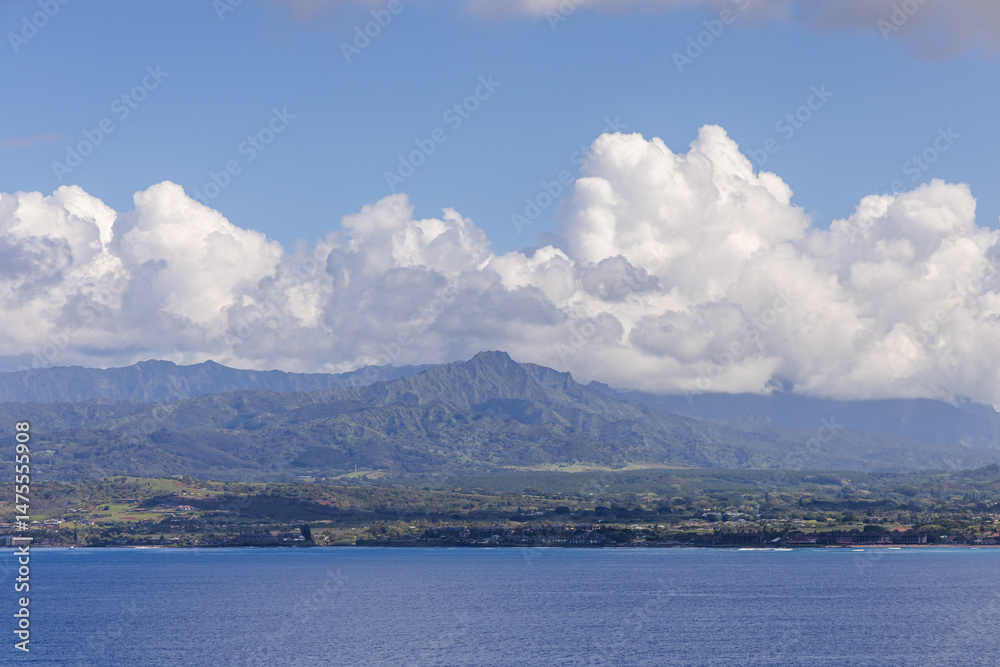 Obraz premium Scenic View Of Kauai's Mountain Range With Blue Ocean and Sky