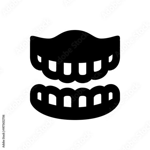 Illustration of a denture set with upper and lower teeth in black silhouette against a white background