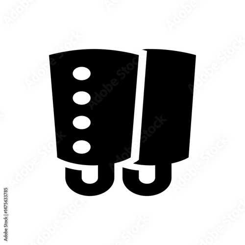 Illustration of two black rectangular objects with rounded bottoms and circular accents on one object
