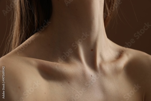 Wallpaper Mural Woman with perfect skin on brown background, closeup Torontodigital.ca