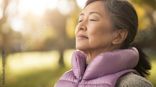 Woman Enjoying Sunshine While Wearing a Cooling Vest for Relief