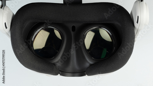 Obraz na płótnie Virtual reality headset displayed on clean surface with clear lenses ready for use w salonie