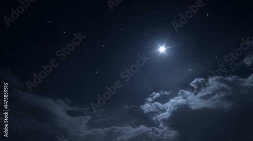 Bright Star Illuminates Night Sky with Clouds and Twinkling Stars