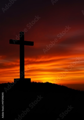 Obraz na płótnie Silhouette of cross against a vibrant sunset sky on hilltop w salonie