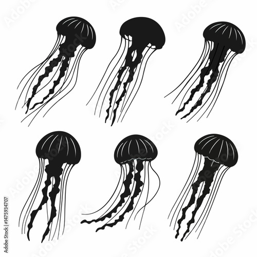 Silhouette of Mystical Jellyfish: A stunning collection of dark silhouette jellyfish against an isolated canvas. Depicting the unique elegance of these captivating creatures.