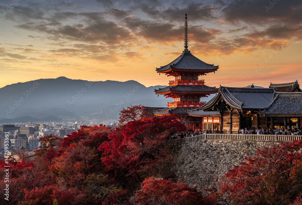 Fototapeta premium Kiyomizu Dera Pagoda Temple with red maple leaves or fall foliage in autumn season. Colorful trees, Kyoto, Japan