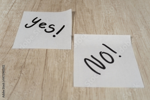 Sticky notes with “yes” in focus and “no” out of focus
