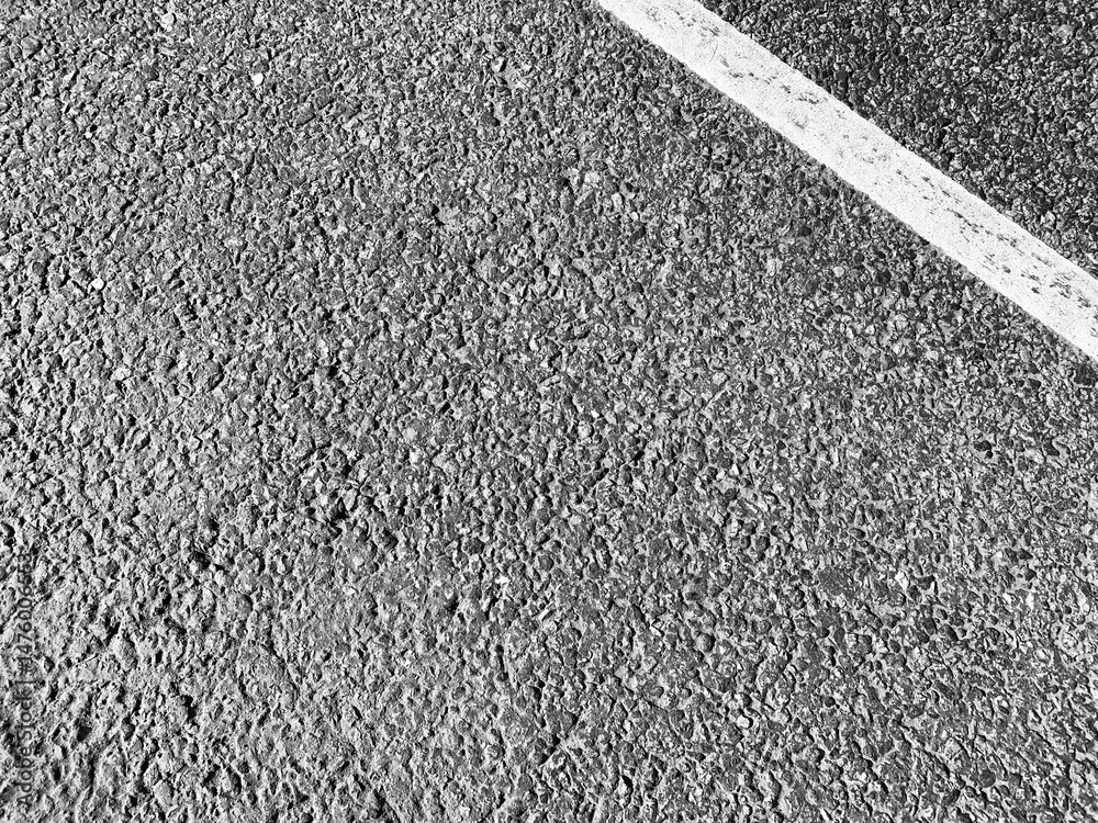 Fototapeta premium Background with asphalt texture. Road with markings. View from above. black and white