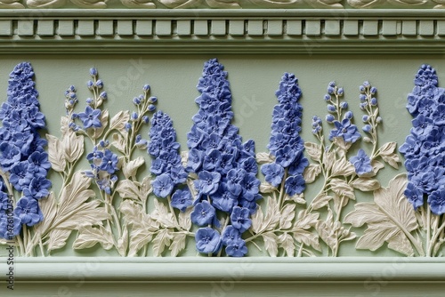 Ornate floral border in light sage green with deep blue flowers.