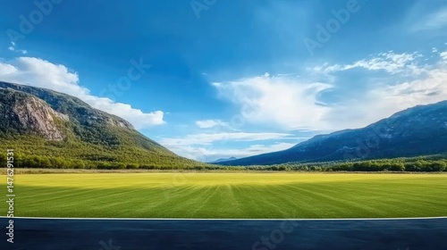 Sunny day with a blue sky, natural grass park, outdoor landscape, scenic road, perfect for travel and outdoor tourism projects. 
