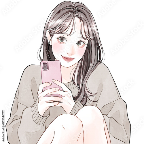 スマホを持って楽しそうな女性