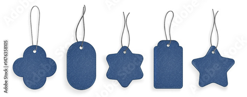 Denim texture patch set for tags - flower, heart, star and square shapes with holes and threads. Realistic blue jeans fabric labels in various forms for fashion design and clothing decoration.