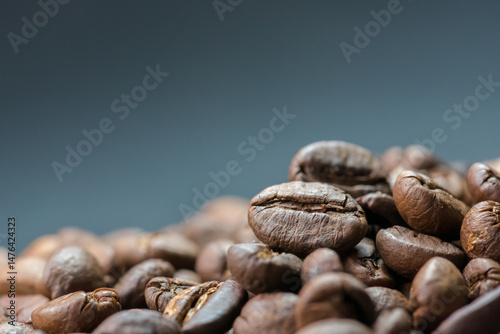 Close up of coffee beans are the background.
