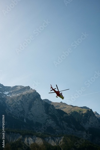 Red helicopter flies away in summer