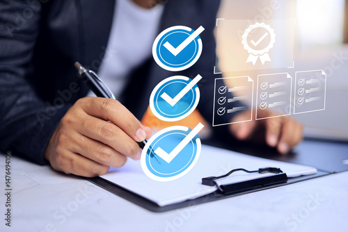 Compliance and certified concept with businessman tick checkmark on document place on working table to apprived to follow regulation requirement