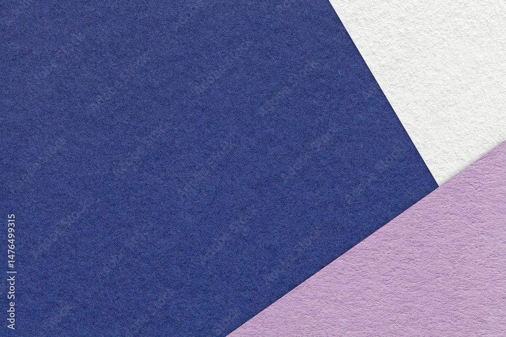 Fototapeta premium Texture craft navy blue paper background with white and violet border. Vintage abstract denim cardboard.