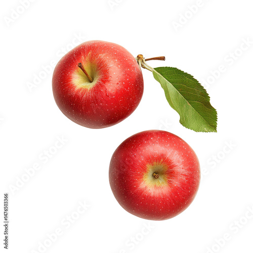 Two ripe red apples with a leaf, overhead view