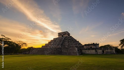 A timelapse showcasing the Temple of Kukulcan (El Castillo) amidst the lush greenery at the heart of the archaeological site in Chichen Itza, a city established by the Maya civilization