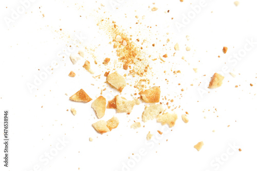 Crumbled Cookie Pieces Exploding Against Black Background