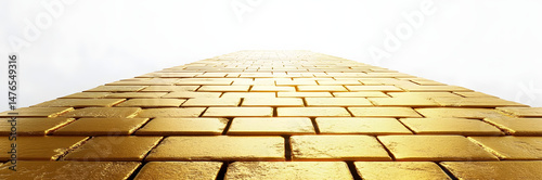 Narrow gold brick pathway on stark white backdrop , bright, straight
