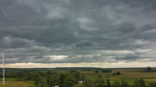 Timelapse of dramatic sky above rural landscape Stormy, clouds moving, countryside