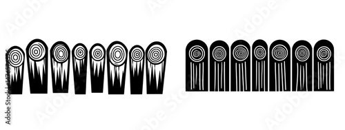 A wooden log fence serves as a rural border barrier with a black silhouette