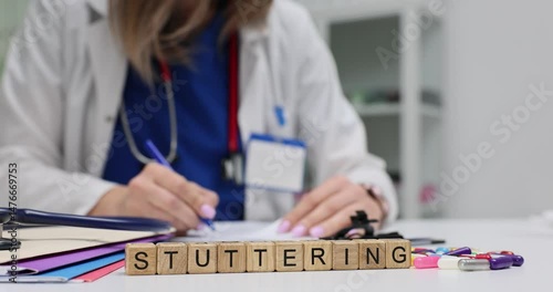 Female doctor makes notes writing prescriptions for Stuttering treatment in clinical office. Patient care and effective communication strategies