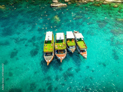 Top aerial view of  natural bay serving ton of traveler tourist  take bundle of tour boats dropped anchorage let people enjoy water sport together  in summertime Thailand travel and visiting