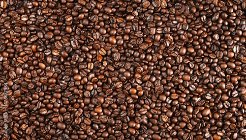 Many roasted coffee beans on white background