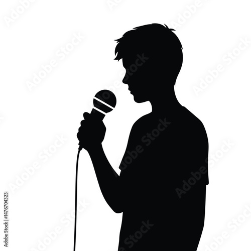 Silhouette of a young person holding a microphone ready to perform or speak