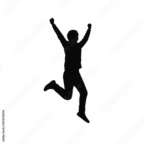 Silhouette of a joyful person celebrating success with arms raised and jumping in happiness