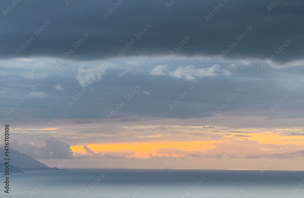 Fototapeta premium Sunset sky. Dramatic sky view. Sunlight over the sea