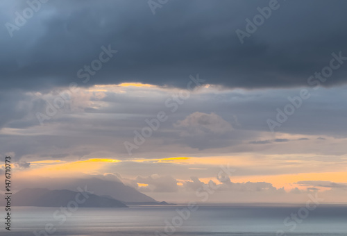 Sunset sky. Dramatic sky view. Sunlight over the sea