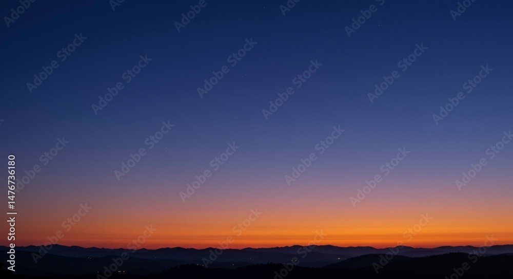 Fototapeta premium Blurry sunrise over misty mountains