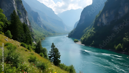 Majestic River Valley with Towering Mountains and Clear Water