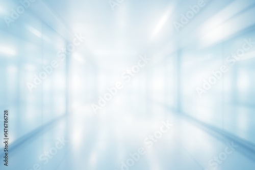 Blurred office background. Bright modern interior in business center during daylight. Abstract light blue background.