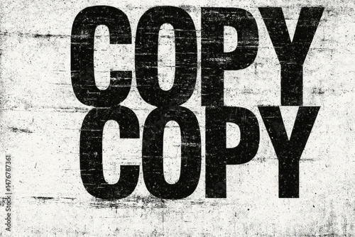 Abstract black letters on white background with distressed, grunge texture.
