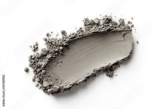 Light gray cosmetic powder swatch.  A textured, smudged swatch of light gray cosmetic powder, unevenly distributed
