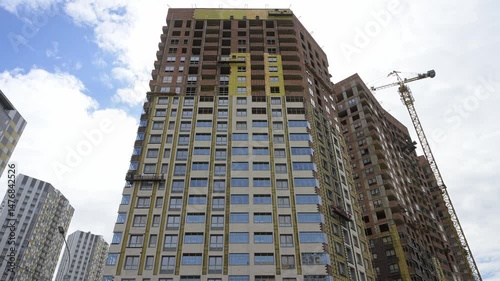 high rise building under construction in city 
