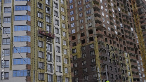 high rise building under construction in city 