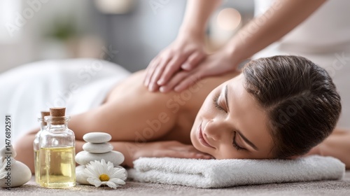 Woman Receiving a Relaxing Back Massage at a Spa